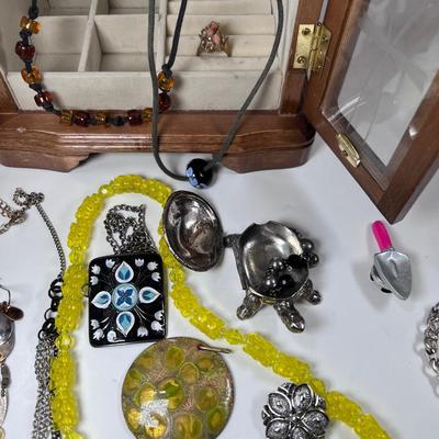large lot vintage costume jewelry and Wooden Armoire