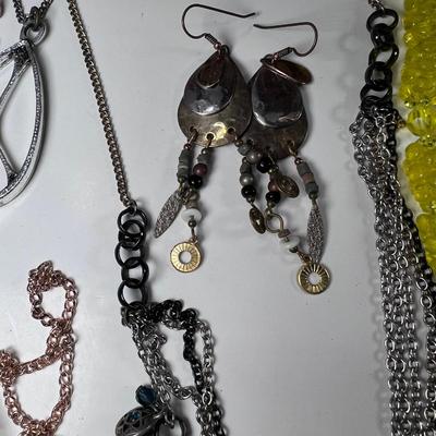 large lot vintage costume jewelry and Wooden Armoire