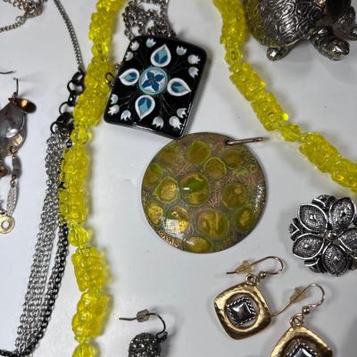 large lot vintage costume jewelry and Wooden Armoire