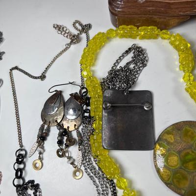 large lot vintage costume jewelry and Wooden Armoire