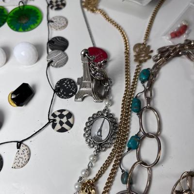 large lot vintage costume jewelry and Wooden Armoire