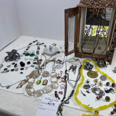 large lot vintage costume jewelry and Wooden Armoire