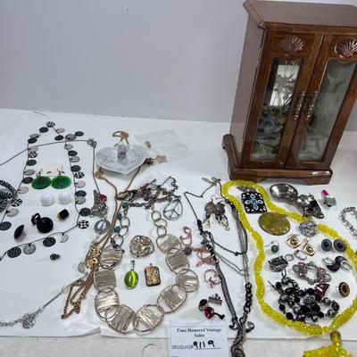 large lot vintage costume jewelry and Wooden Armoire
