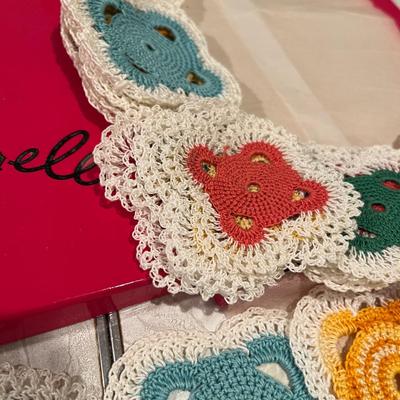 Schiaparelli box fill with crocheted squares coasters