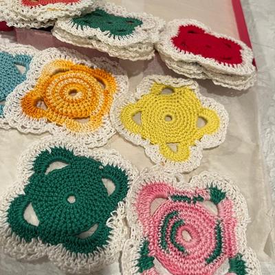 Schiaparelli box fill with crocheted squares coasters