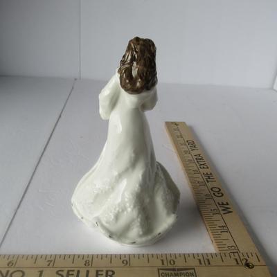 Lot 454:  Vintage Royal Doulton Lady Figurine, Christmas Day, 1993