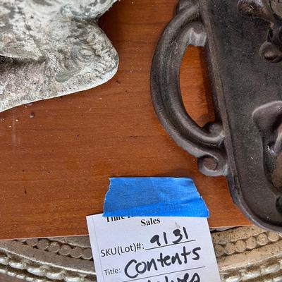 Collectibles on five shelves