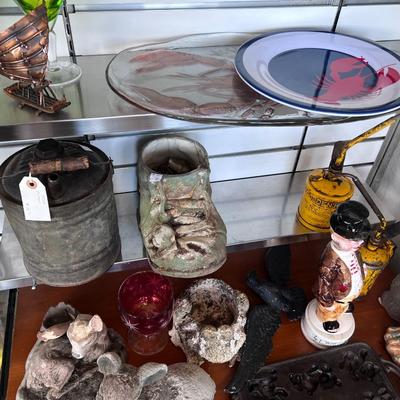 Collectibles on five shelves