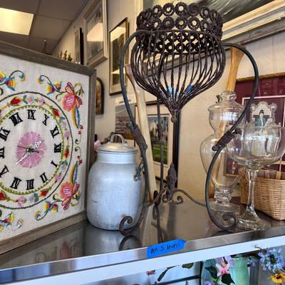Collectibles on five shelves