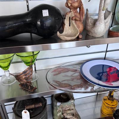 Collectibles on five shelves