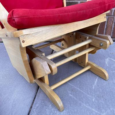 LIGHT WOOD GLIDER ROCKER WITH RED VELVET CUSHIONS