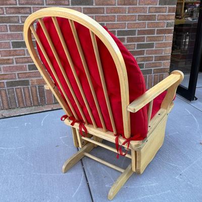 LIGHT WOOD GLIDER ROCKER WITH RED VELVET CUSHIONS
