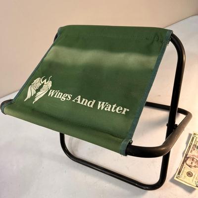 â€œWINGS & WATERâ€ FOLDING METAL, CANVAS CAMP STOOL