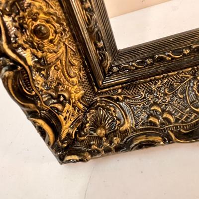 LARGE ORNATE FRAME 20â€ X 48â€ BLACK AND GOLD