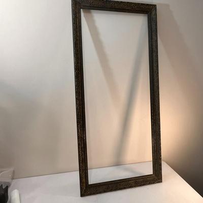 LARGE ORNATE FRAME 20â€ X 48â€ BLACK AND GOLD