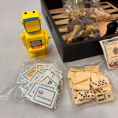 TRAY FULL OF VARIOUS VINTAGE GAME PIECES: DICE, CHESS, POKER MACHINES, ETC.