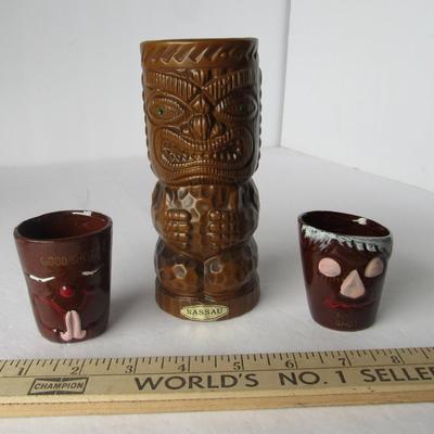 Lot 482:  Tiki Vase and Two Funny Face Shot Glasses