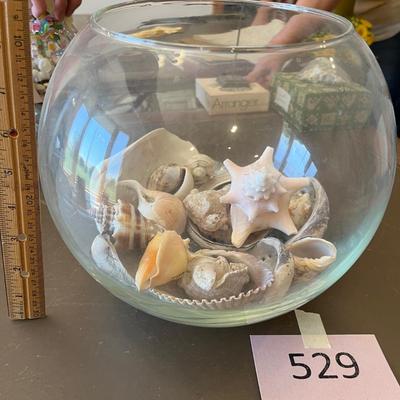 Fish bowl with shells