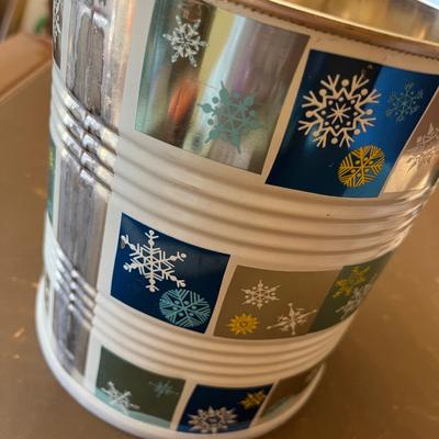 Tin canister with shells