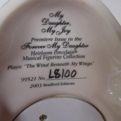 Heirloom Porcelain Musical Figurine Collection