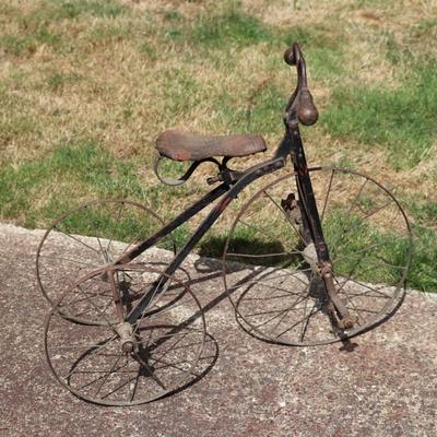 Antique Victorian Tricycle with Decorated Metal Frame and Original Leather Seat