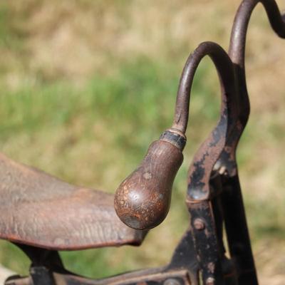 Antique Victorian Tricycle with Decorated Metal Frame and Original Leather Seat