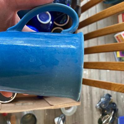 30 miscellanious blue mugs