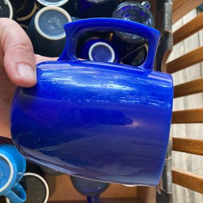 30 miscellanious blue mugs