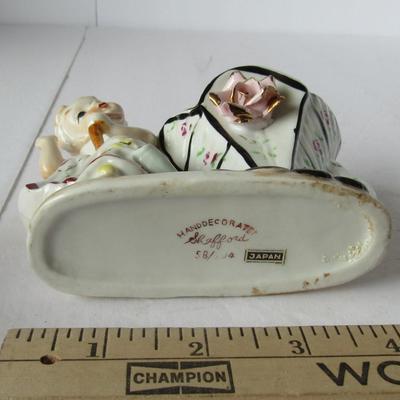 Lot 490:  Vintage Planter With Lady and Applied Rose