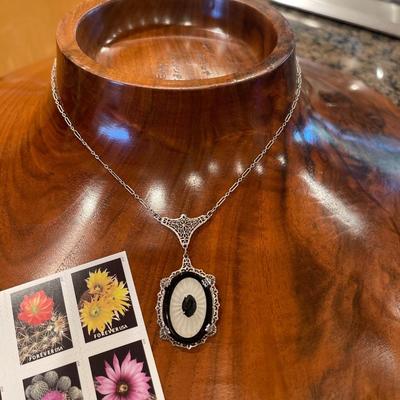 Antique Sterling, onyx, and Lucite necklace