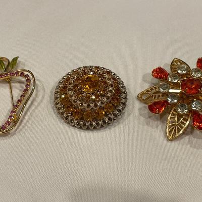 Brooches with stones