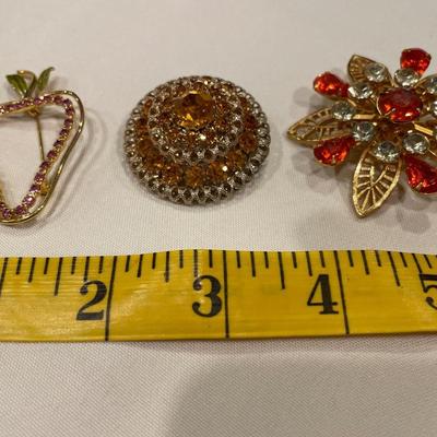 Brooches with stones