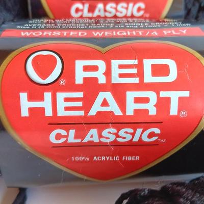 Seven Skeins of Red Heart yarn Classic 12 Black color