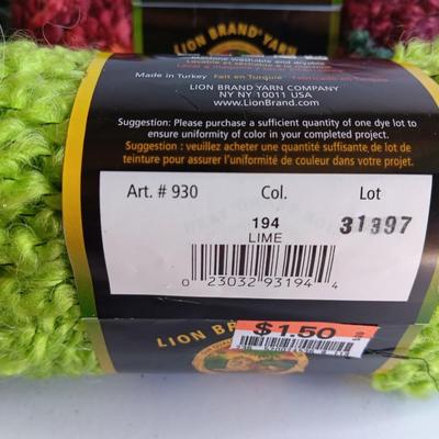 Variety of different colored skeins of yarn