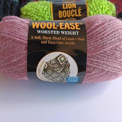 Variety of different colored skeins of yarn