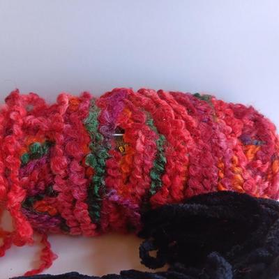 Variety of different colored skeins of yarn
