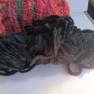 Variety of different colored skeins of yarn