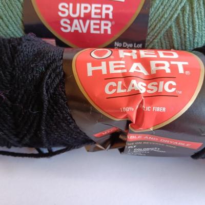 Variety of different colored skeins of yarn