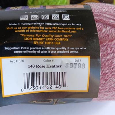 Variety of different colored skeins of yarn
