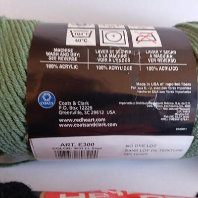 Variety of different colored skeins of yarn