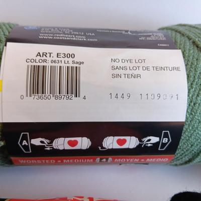 Variety of different colored skeins of yarn
