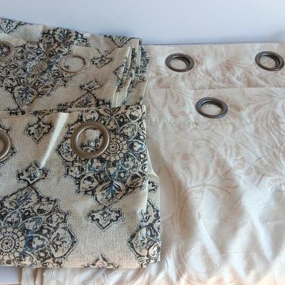 Two sets of 64" long Drapes / Curtains with metal rod rings