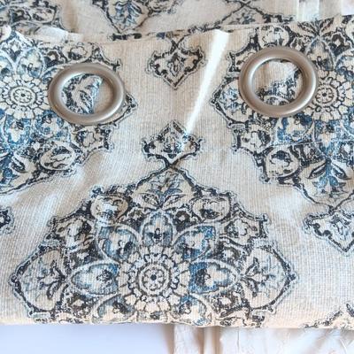 Two sets of 64" long Drapes / Curtains with metal rod rings