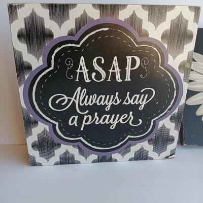 Harold Feinstein floral wall art and ASAP Always say a Prayer wall hanging