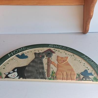Wooden wall mount shelf with Home sweet Home wall hanging