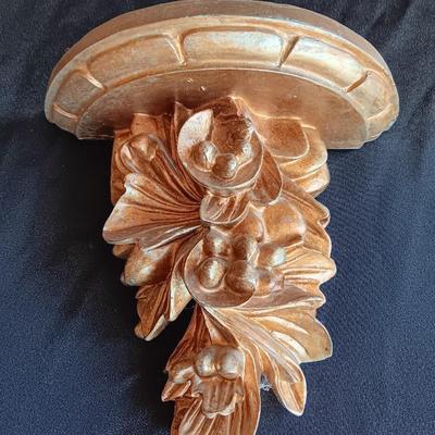 Gold decorative framed wall mirror with wall shelf and Sand dollars