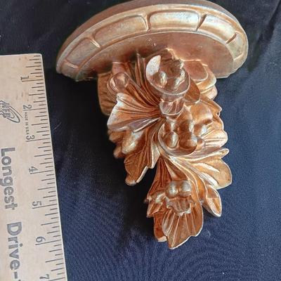Gold decorative framed wall mirror with wall shelf and Sand dollars