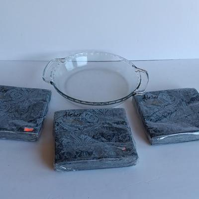 Glass pie dish with three new packages of napkins - Just in time for fresh apple pie!