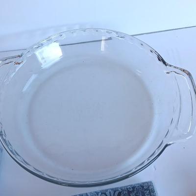 Glass pie dish with three new packages of napkins - Just in time for fresh apple pie!