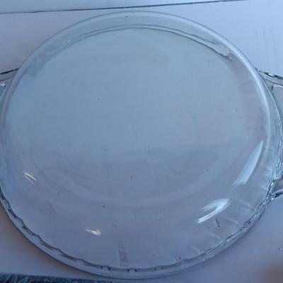 Glass pie dish with three new packages of napkins - Just in time for fresh apple pie!